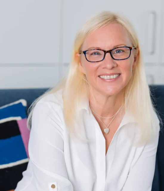 Professional_photo_seated_ Portrait of Hattie, psychotherapist at Reflect Therapy Exeter